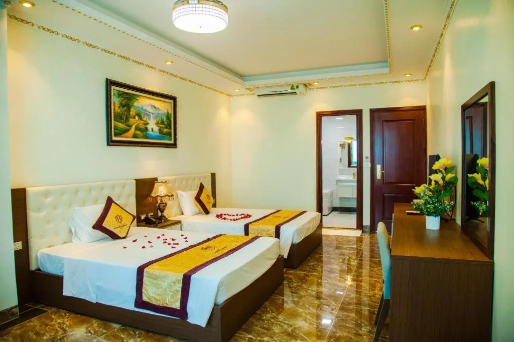 Bed in BACNINH HARMONY HOTEL
