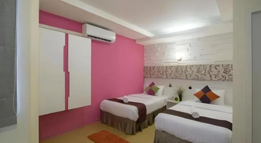 Bed in The Konnect Hotel