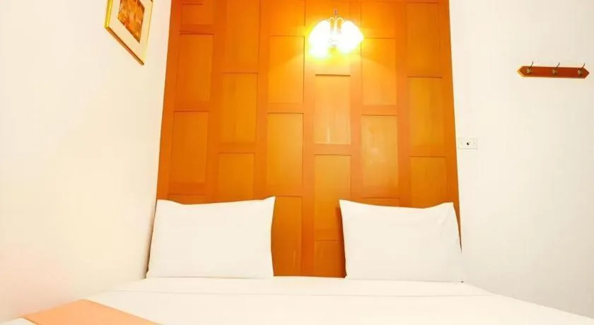 Bed in New Siam Guest House