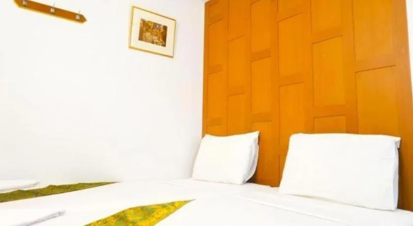 Bed in New Siam Guest House