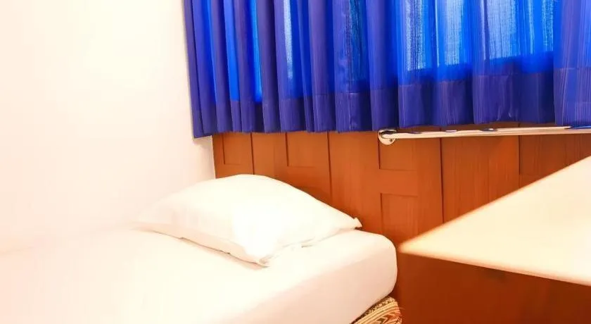 Bed in New Siam Guest House