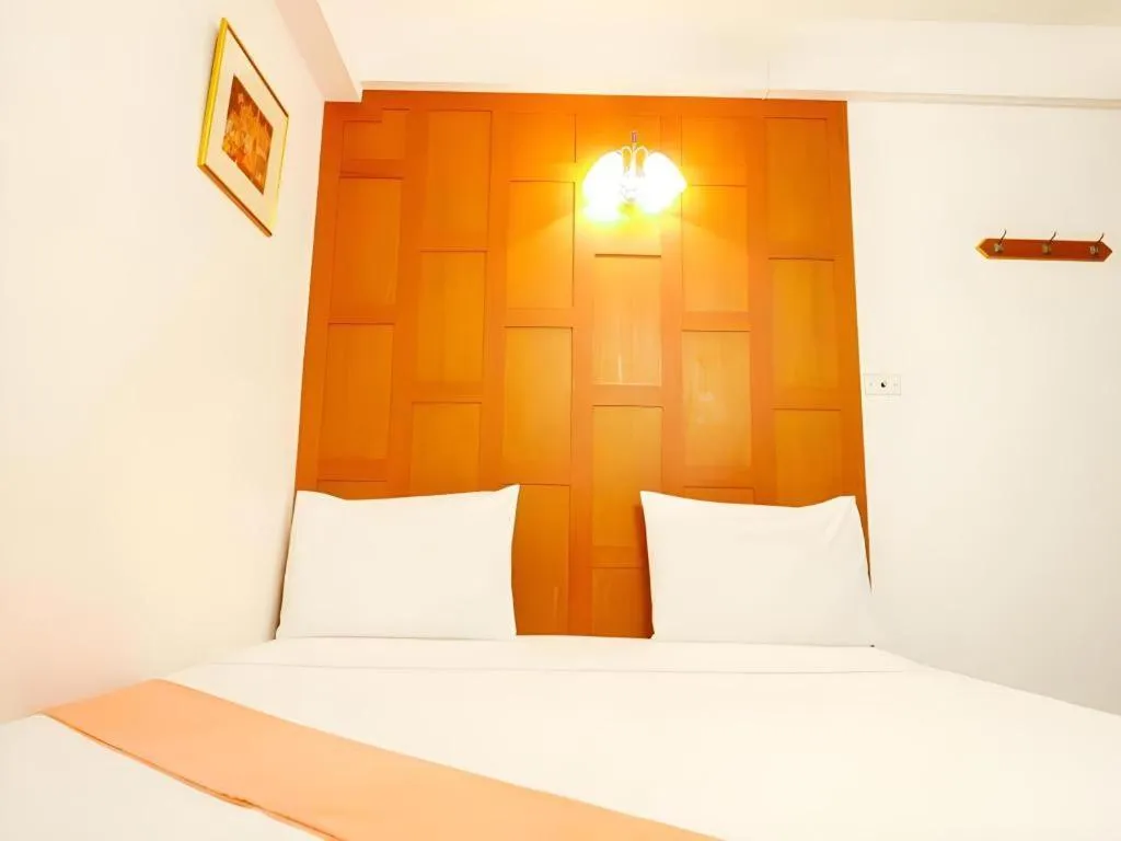 Bed in New Siam Guest House