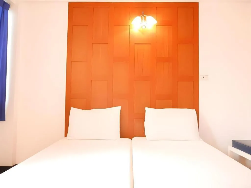 Bed in New Siam Guest House