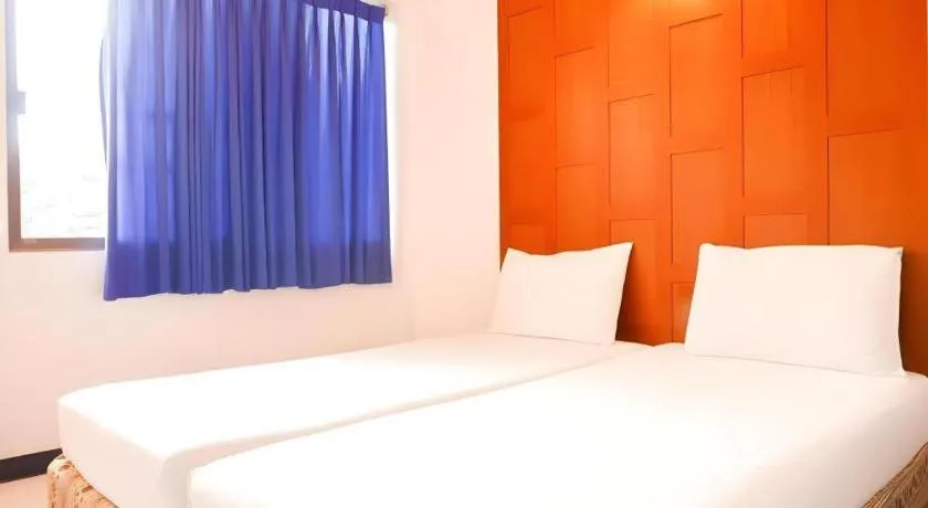 Bed in New Siam Guest House