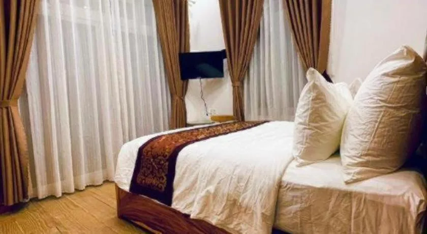 Bed in La Roza Dalat Boutique Hotel