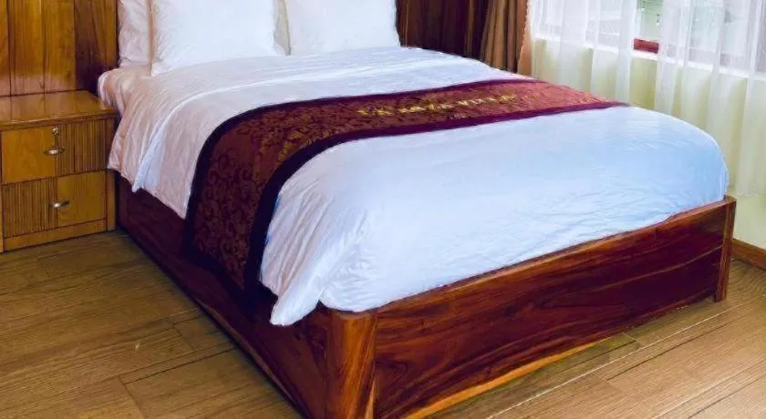 Bed in La Roza Dalat Boutique Hotel