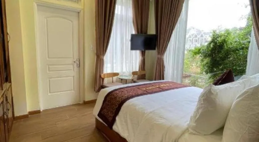 Bed in La Roza Dalat Boutique Hotel