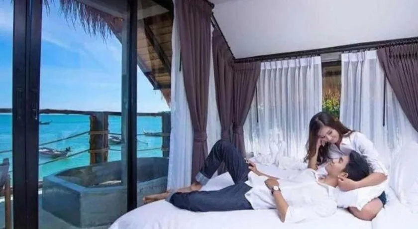 Bed in Koh Mook De Tara Beach Resort