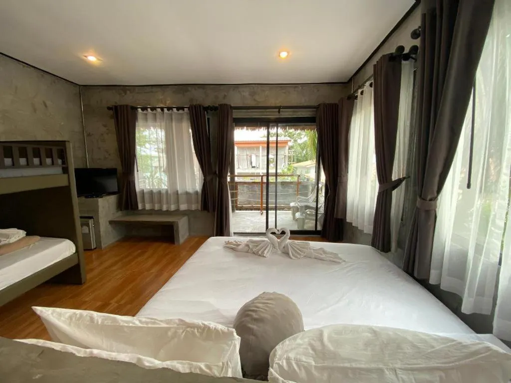 Bed in Koh Mook De Tara Beach Resort