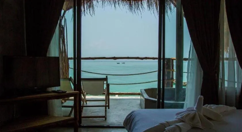 Bed in Koh Mook De Tara Beach Resort