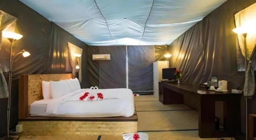 Bed in Koh Mook De Tara Beach Resort