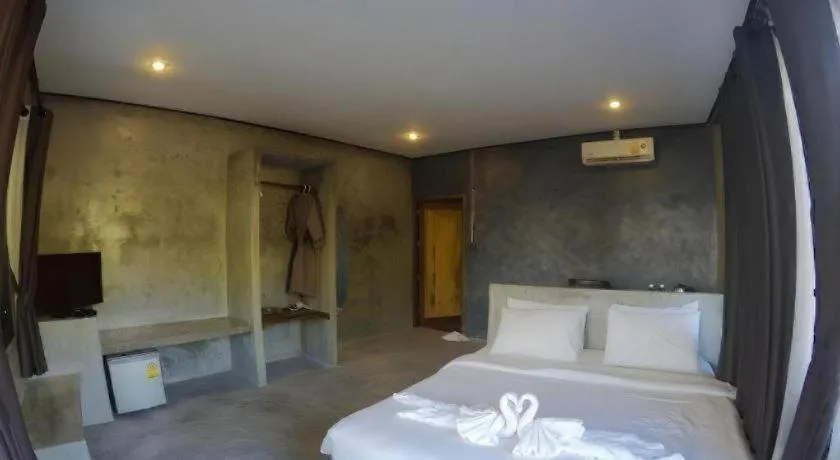 Bed in Koh Mook De Tara Beach Resort