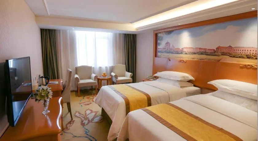 Bed in Vienna Hotel Xi'an Zhonglou