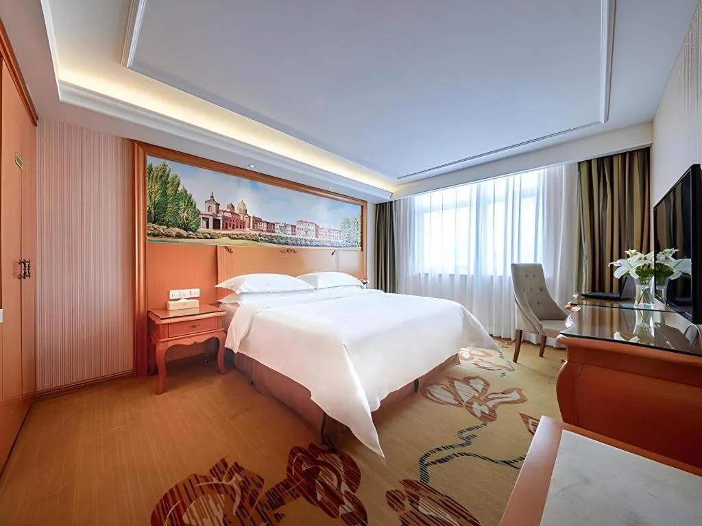 Bed in Vienna Hotel Xi'an Zhonglou