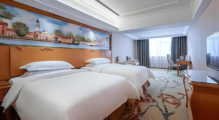 Bed in Vienna Hotel Xi'an Zhonglou