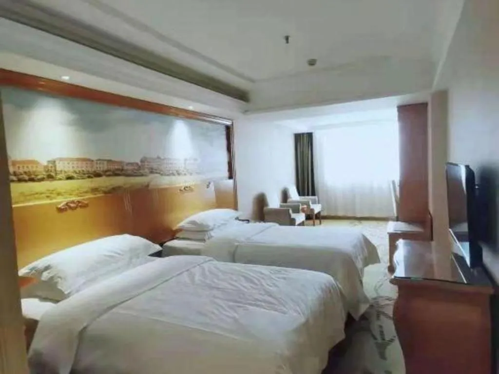 Bed in Vienna Hotel Xi'an Zhonglou