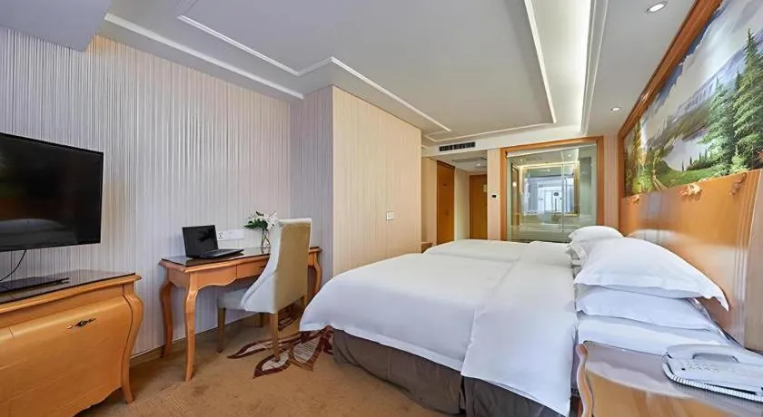 Bed in Vienna Hotel Xi'an Zhonglou