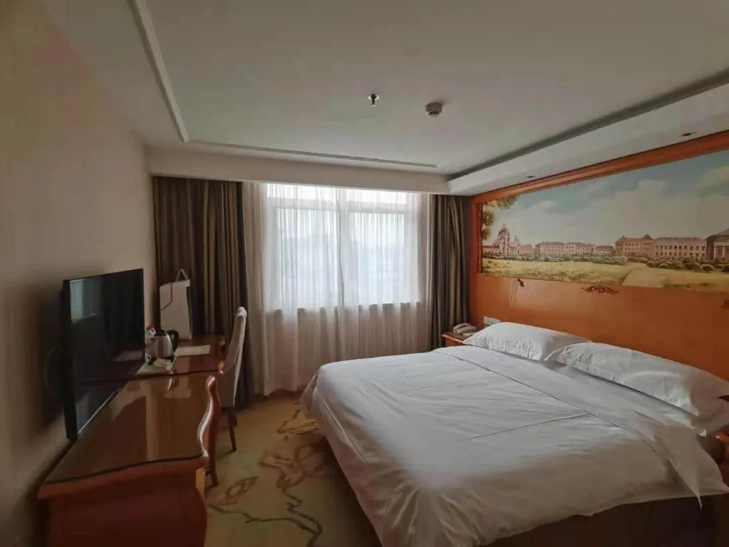 Bed in Vienna Hotel Xi'an Zhonglou