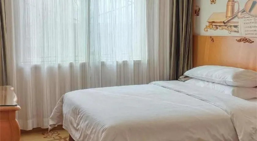 Bed in Vienna Hotel Xi'an Zhonglou