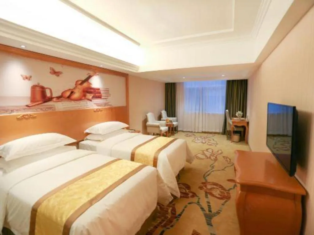 Bed in Vienna Hotel Xi'an Zhonglou