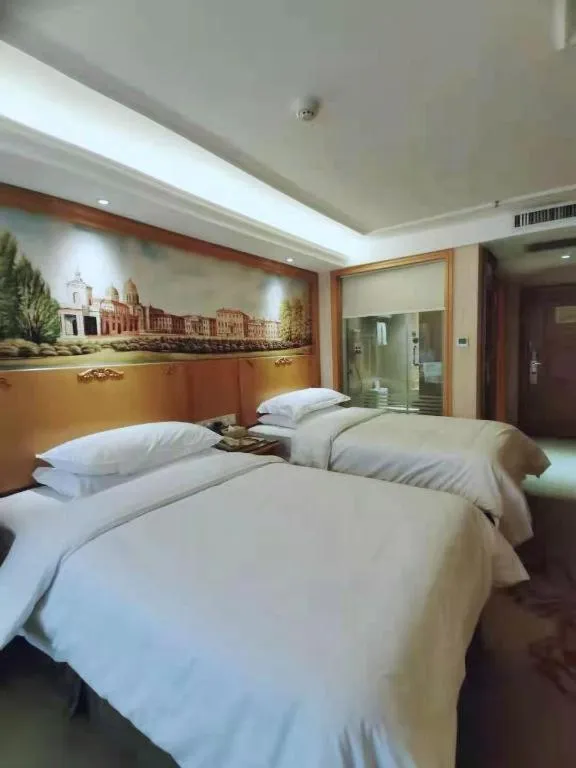 Bed in Vienna Hotel Xi'an Zhonglou