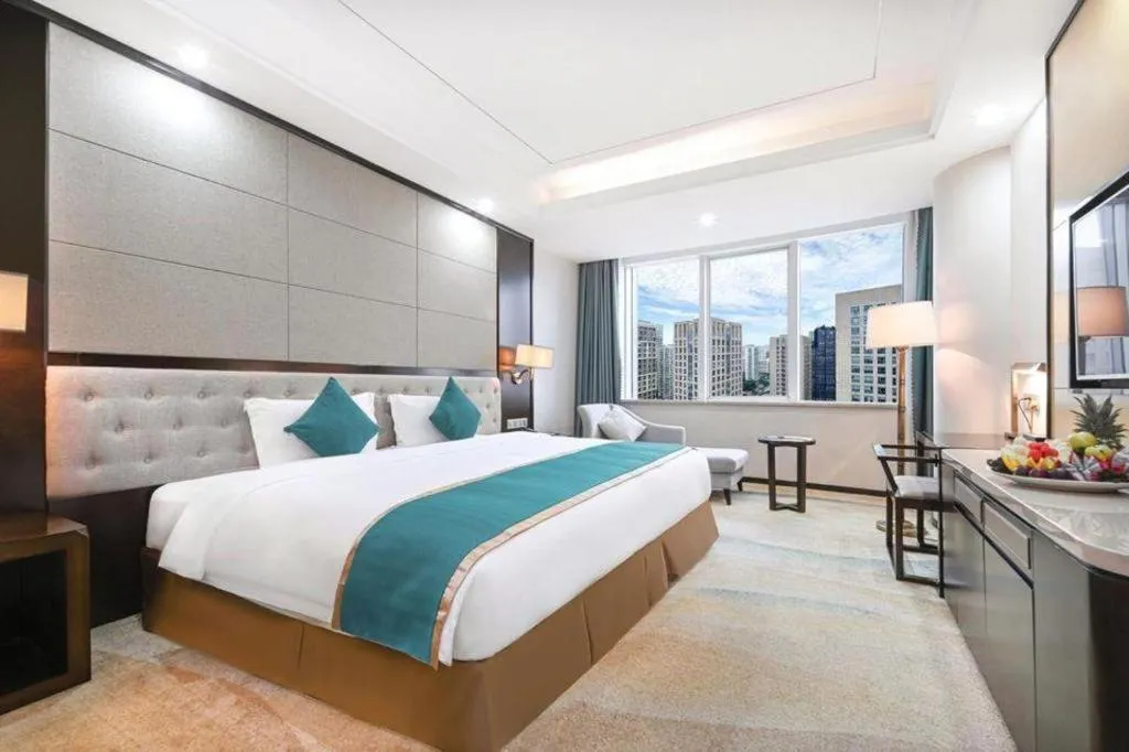 Bed in Hundred Hotel Qingdao