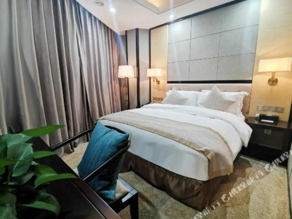Bed in Hundred Hotel Qingdao