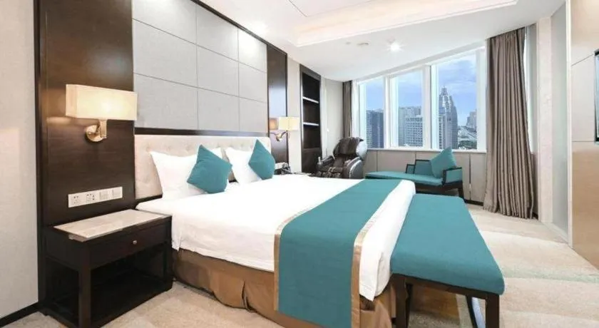 Bed in Hundred Hotel Qingdao