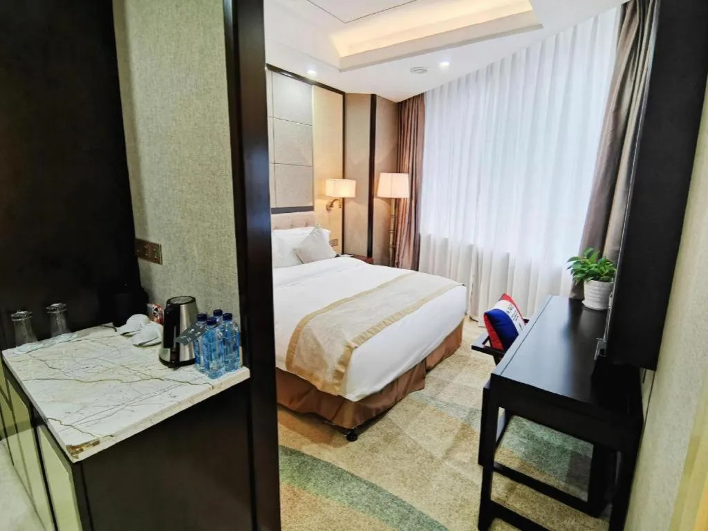 Bed in Hundred Hotel Qingdao