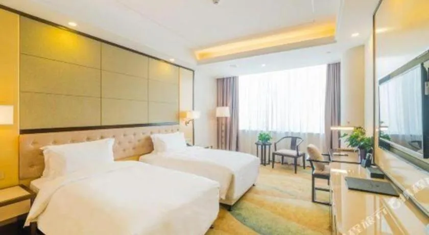 Bed in Hundred Hotel Qingdao