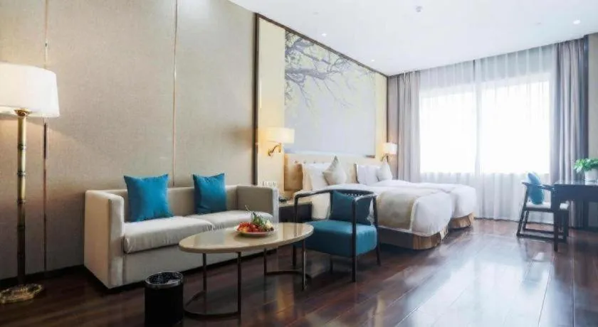 Bed in Hundred Hotel Qingdao