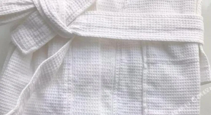 Bed in Hundred Hotel Qingdao