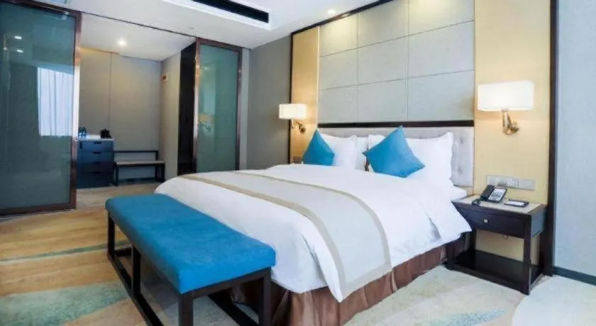 Bed in Hundred Hotel Qingdao