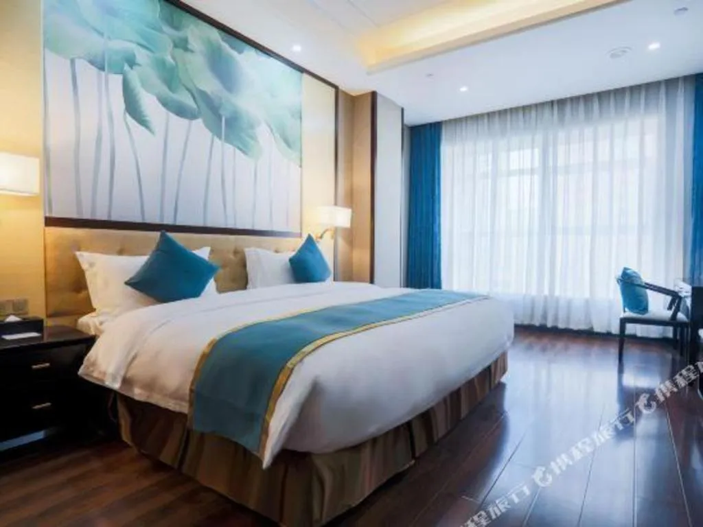 Bed in Hundred Hotel Qingdao