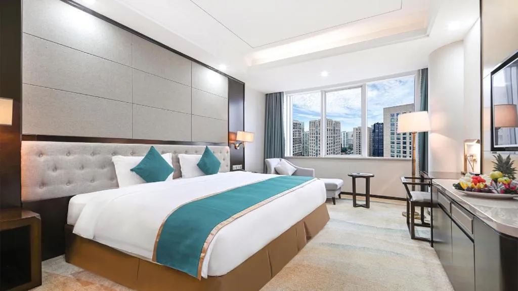 Bed in Hundred Hotel Qingdao