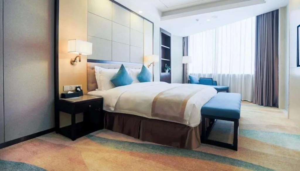 Bed in Hundred Hotel Qingdao