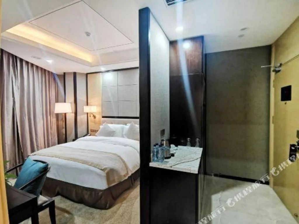 Bed in Hundred Hotel Qingdao