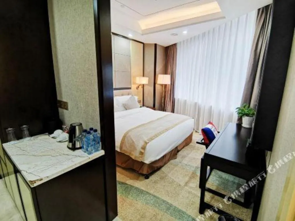 Bed in Hundred Hotel Qingdao