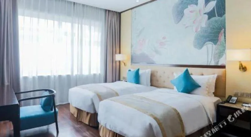 Bed in Hundred Hotel Qingdao