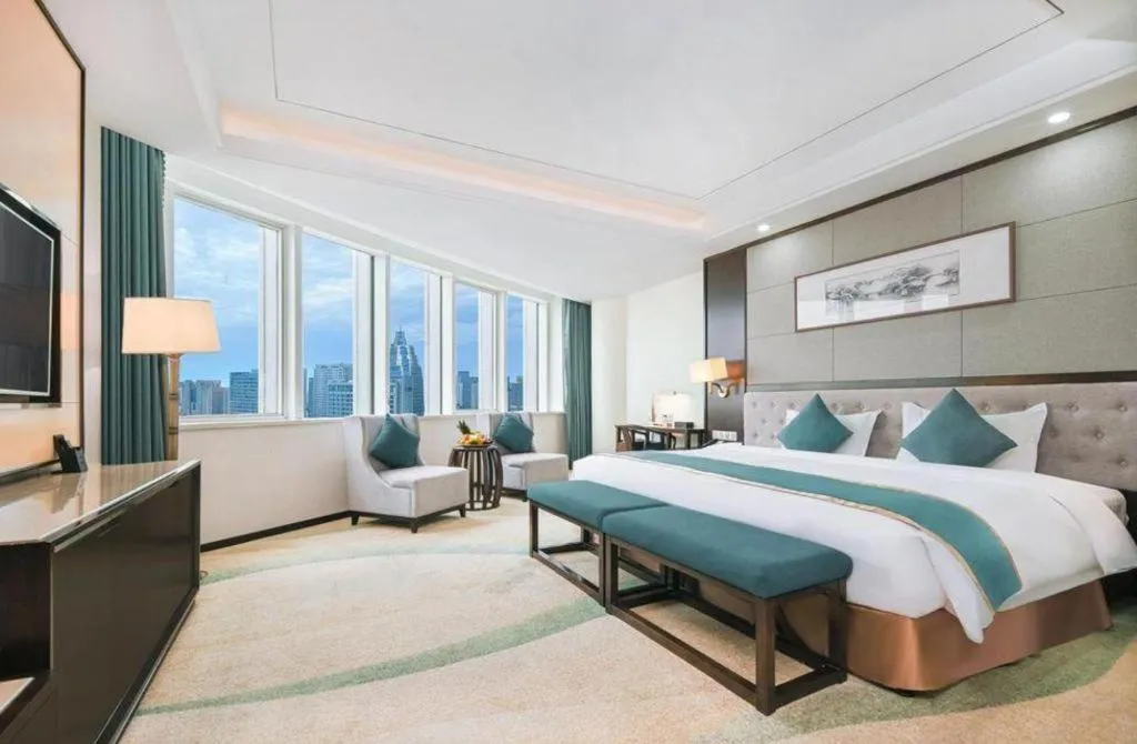 Bed in Hundred Hotel Qingdao