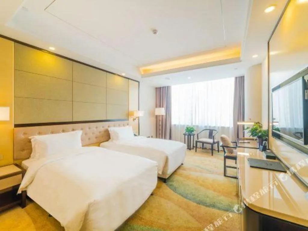 Bed in Hundred Hotel Qingdao