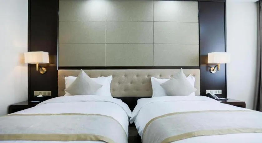 Bed in Hundred Hotel Qingdao