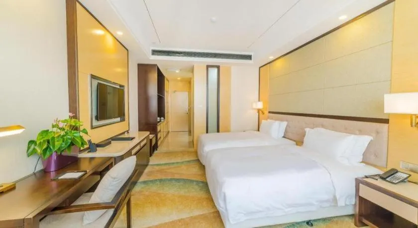 Bed in Hundred Hotel Qingdao