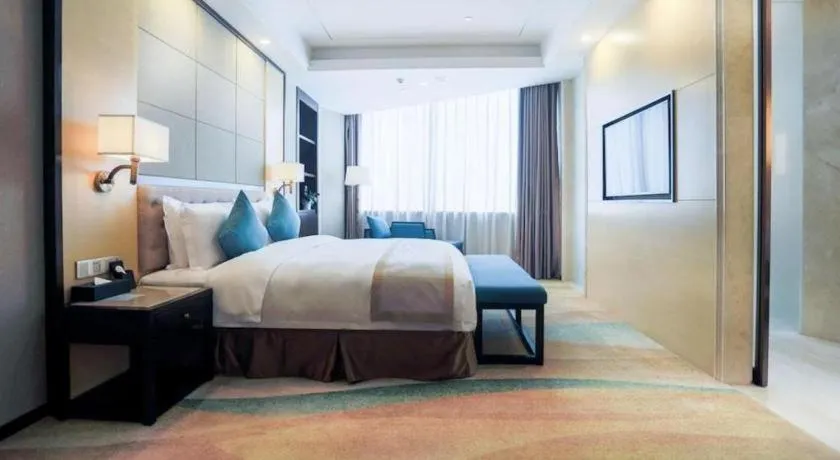 Bed in Hundred Hotel Qingdao
