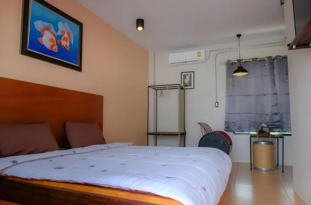 Bed in RiverHills Resort