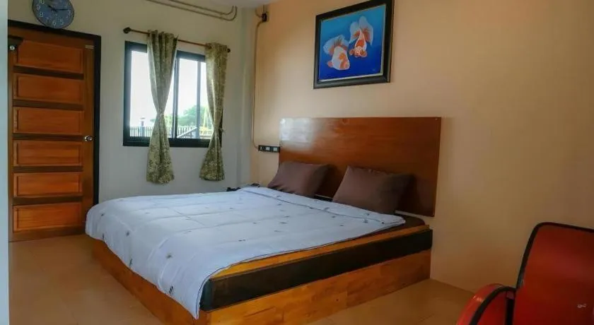 Bed in RiverHills Resort