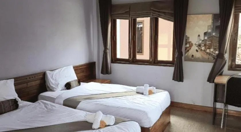 Bed in Baan Home Resort