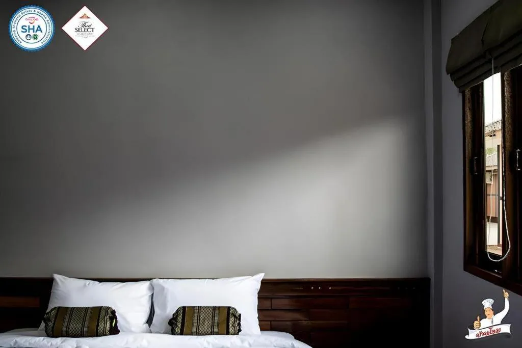 Bed in Baan Home Resort