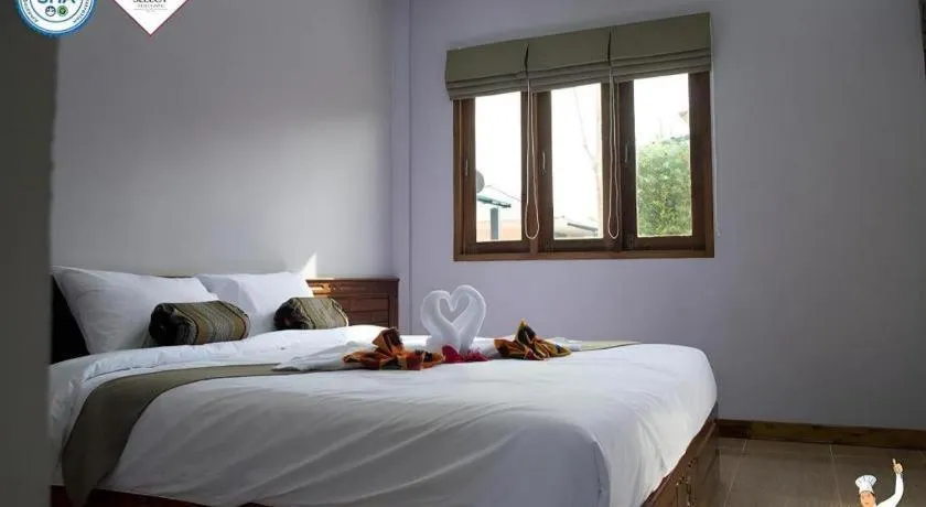 Bed in Baan Home Resort