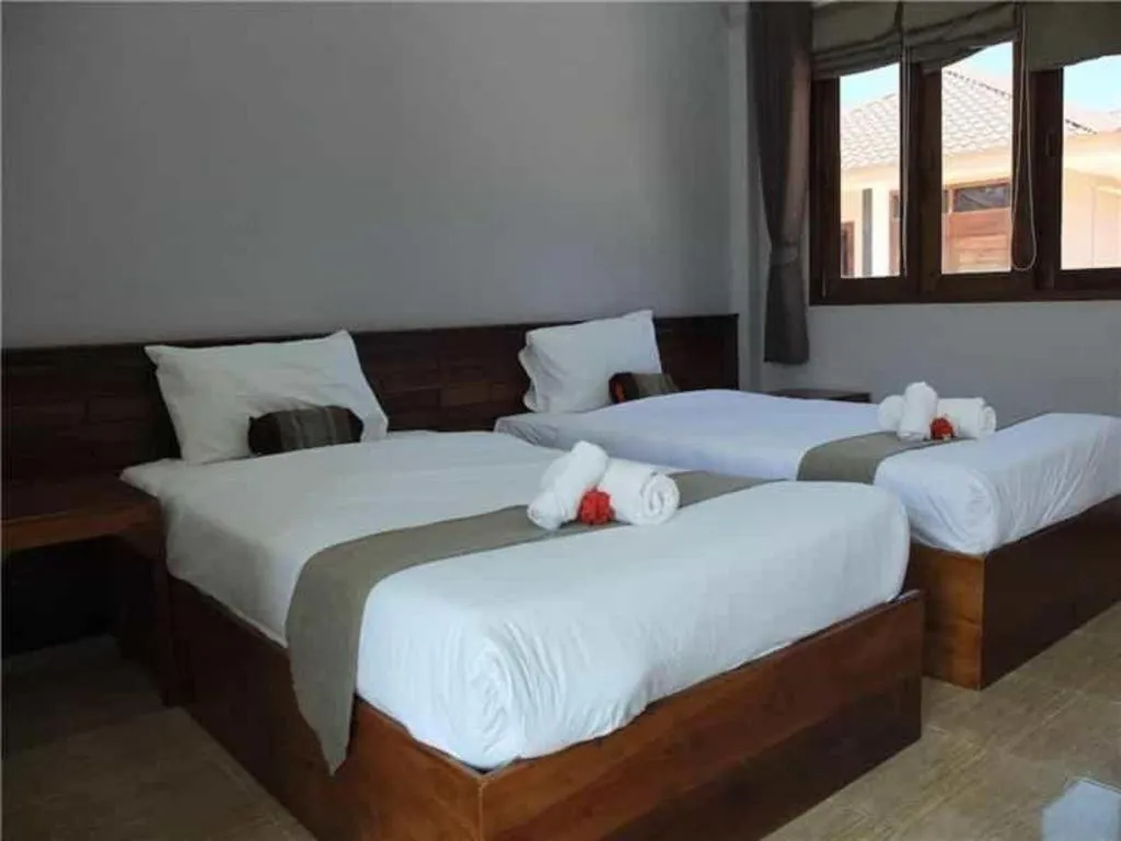 Bed in Baan Home Resort